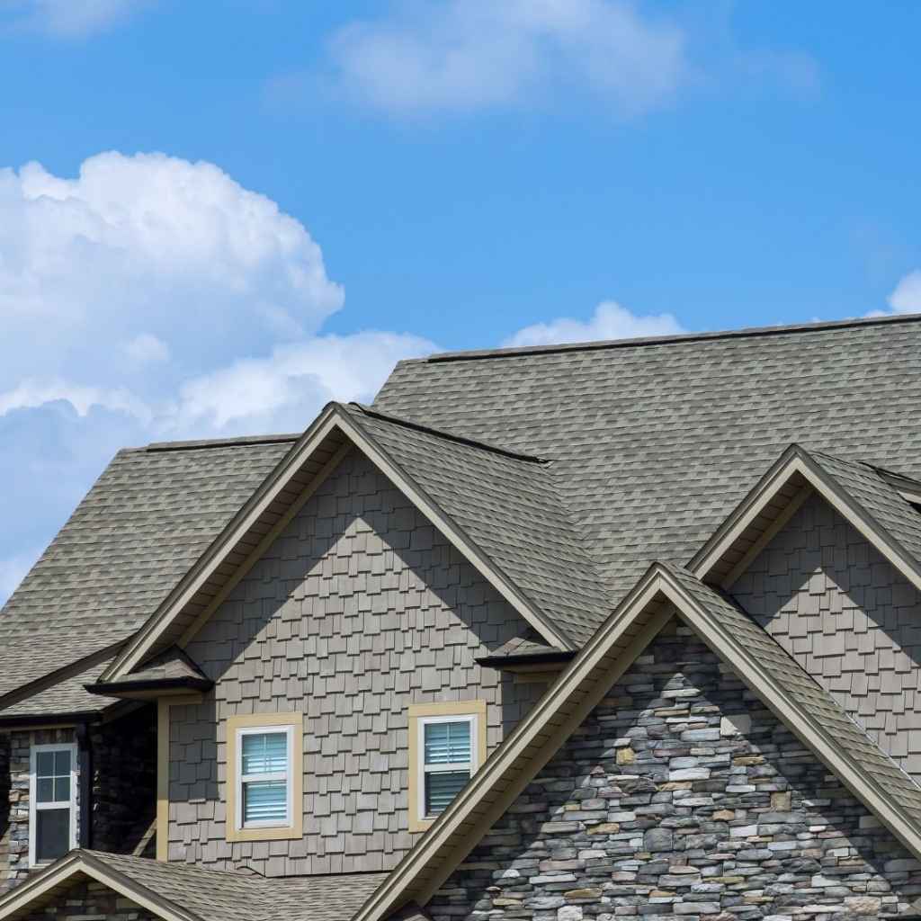 Dark gray modular roofing installed by a Local roofers in Newport News VA on a modern home.