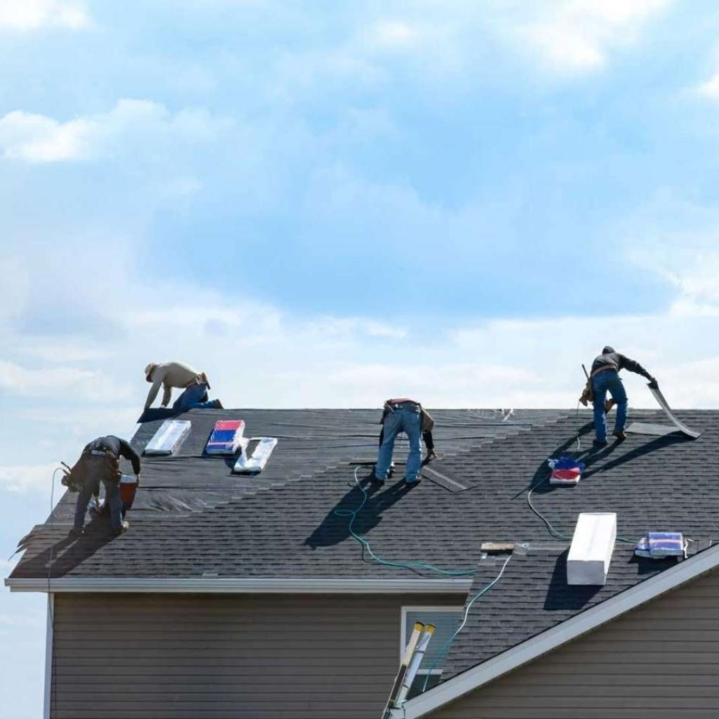 Roofer performing chimney flashing repair by a certified Certified roofers Newport News VA technician.