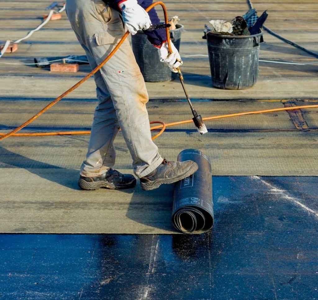 man installing bitumen Suffolk, Va